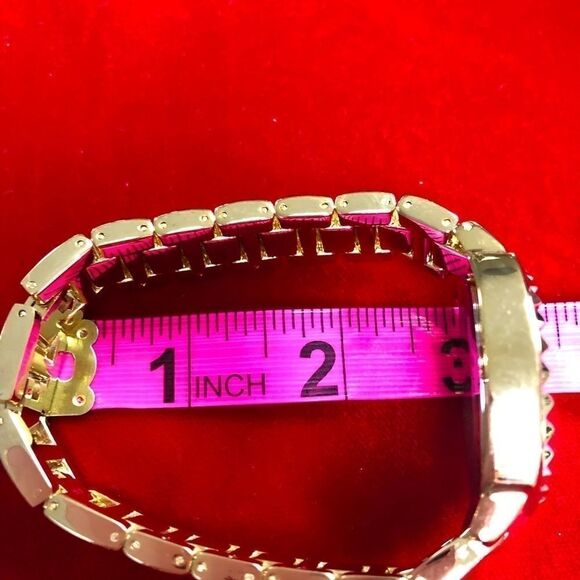NEW WITH TAGS!! Wildlife gold-tone ladies wristwatch by Heidi Klum